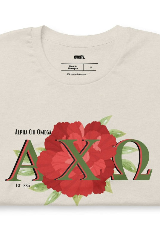 Showcase your Alpha Chi Omega pride with this Est 1885 red carnation graphic tee - the ultimate sorority shirt for style and sisterhood. cream graphic tee