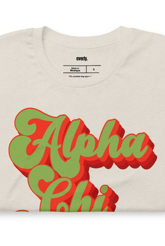 Get a retro-chic look with this Alpha Chi Omega Est 1885 graphic tee - a trendy choice for sorority shirts that combines timeless style with sisterhood pride. Cream graphic tee