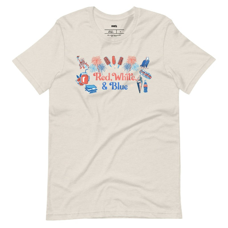 A vibrant graphic tee for the USA July 4th celebration featuring the text "Red White Blue" in bold and patriotic colors. The design is filled with various images associated with July 4th, including fireworks, American flags, stars, and stripes, evoking a sense of national pride and celebration on a heather dust graphic tee.