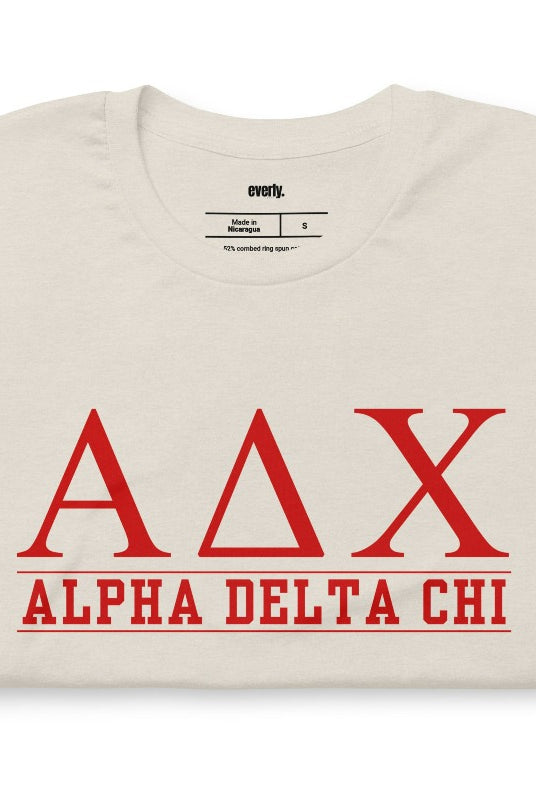Heather Dust graphic tee featuring Alpha Delta Chi letters with 'Alpha Delta Chi' written below