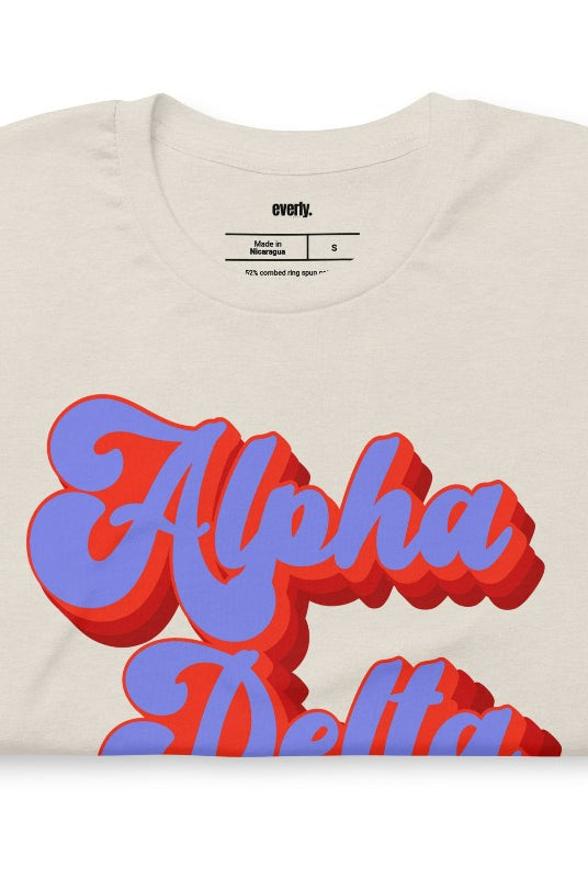 Heather dust graphic tee featuring 'Alpha Delta Chi' in retro lettering
