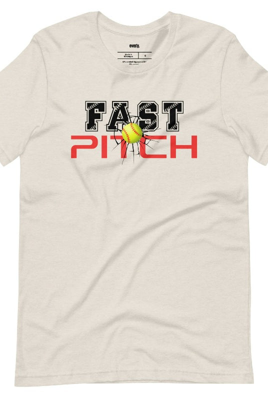Fast pitch softball graphic tee on a heather dust shirt.