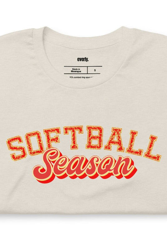 Softball season sports lettering heather dust graphic tee.