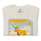 Heather Dust Bella + Canvas 3001 t-shirt featuring a colorful Denali National Park graphic with a moose and mountains, showcasing the beauty of Alaska's wilderness.