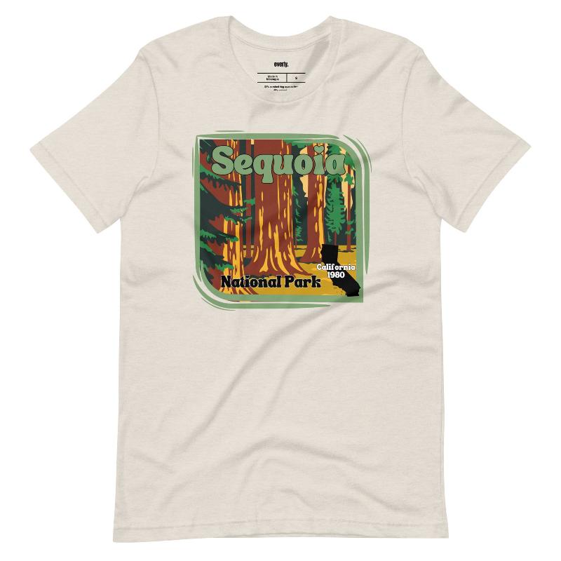 a vibrant illustration of Sequoia National Park, showcasing towering sequoia trees with a vintage-inspired design on a beige shirt.