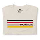 A Bella + Canvas 3001 unisex t-shirt featuring stylish stripes in black, red, and gold with "Louisville" text, perfect for University of Louisville fans, made of 100% combed and ring-spun cotton on a beige shirt.