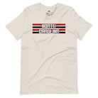 "North Carolina" in bold red and white text on a black and red striped background across the chest on a beige shirt.