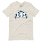 UNC - University of North Carolina design with blue and white motifs on a beige shirt.