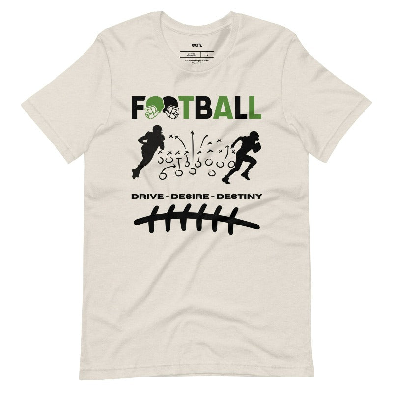 a football-themed design with the word "FOOTBALL" in bold text, accompanied by helmet icons. The design includes silhouettes of football players, a play diagram, and the words "Drive - Desire - Destiny" below on a beige shirt.