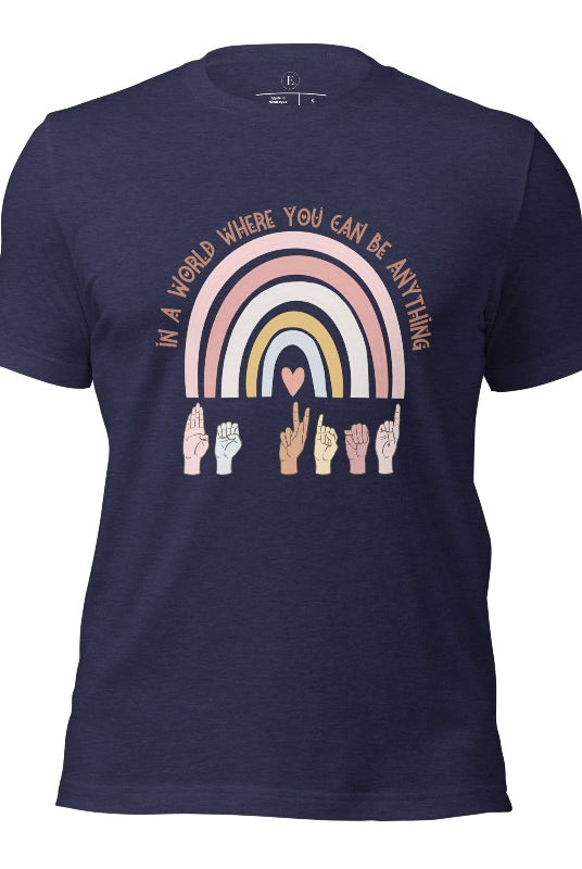 American sign language shirt with a rainbow and the phrase "In a world where you can be anything" and hands signing 'Be Kind' at the bottom on the rainbow on a heather midnight navy colored shirt.