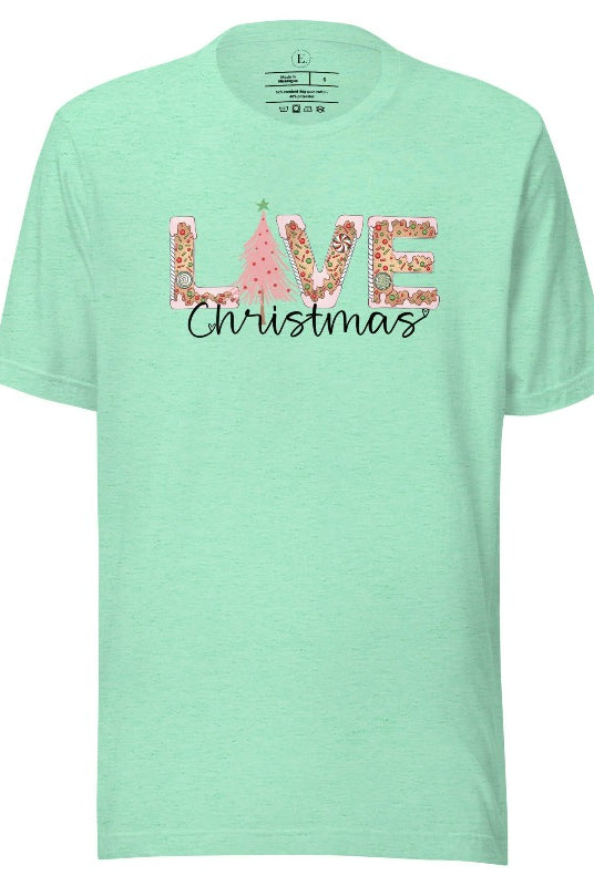Get ready to celebrate the holiday season in style with our Christmas shirt featuring cute gingerbread cookies arranged to spell out the word "Love" on a heather mint colored shirt.