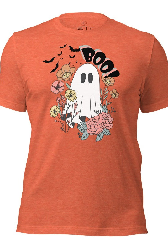 Get ready for Halloween with our cute and spooky ghost-themed shirt! Featuring a whimsical design with a cute ghost, flowers, and bats in a starry sky, it's the perfect blend of spooky and sweet on heather orange shirt. 