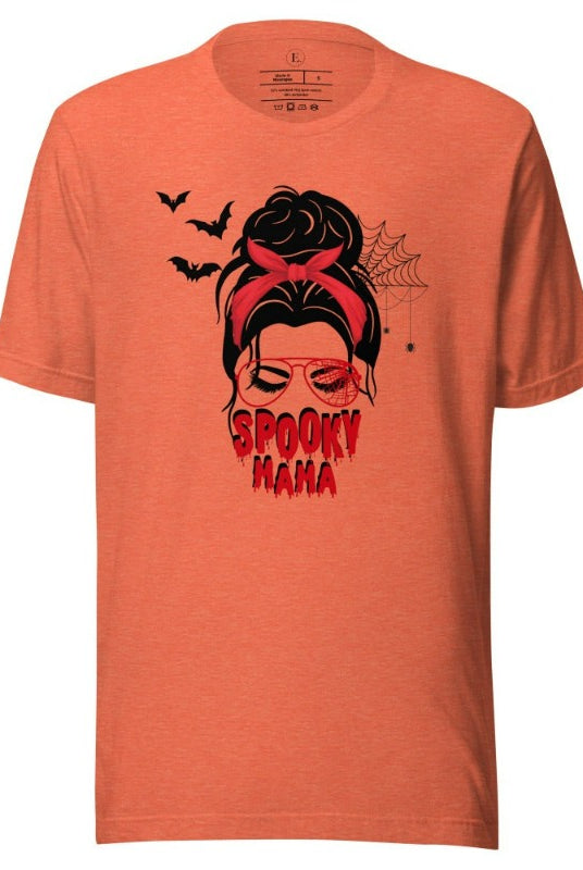"Spooky Mama" messy bun Halloween T-shirt on heather orange colored t-shirt.