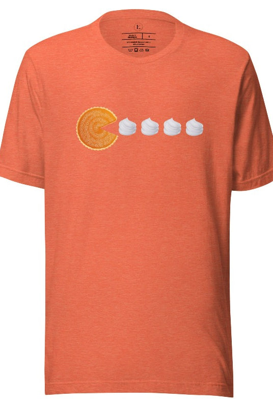 Level up your style with our playful t-shirt featuring a pumpkin pie shaped like Pac-Man devouring whipped cream swirls on a heather orange shirt. 