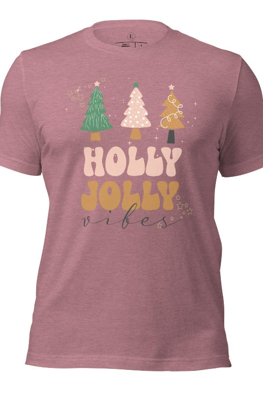 Get ready to feel the holly jolly vibes with our Christmas shirt! This festive shirt features a playful message that reads "Holly Jolly Vibes" and is adorned with cheerful Christmas trees, radiating the holiday cheer on a heather orchid shirt.