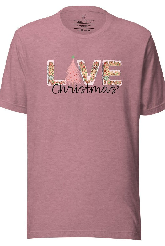 Get ready to celebrate the holiday season in style with our Christmas shirt featuring cute gingerbread cookies arranged to spell out the word "Love" on a heather orchid colored shirt.