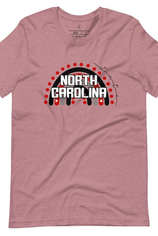 Looking for a way to show off your vibrant spirit? Look no further than this NC State University t-shirt. The NC State colors shine on a boho rainbow backdrop, representing the iconic North Carolina wordmark in a unique and trendy way on a heather orchid colored shirt. 