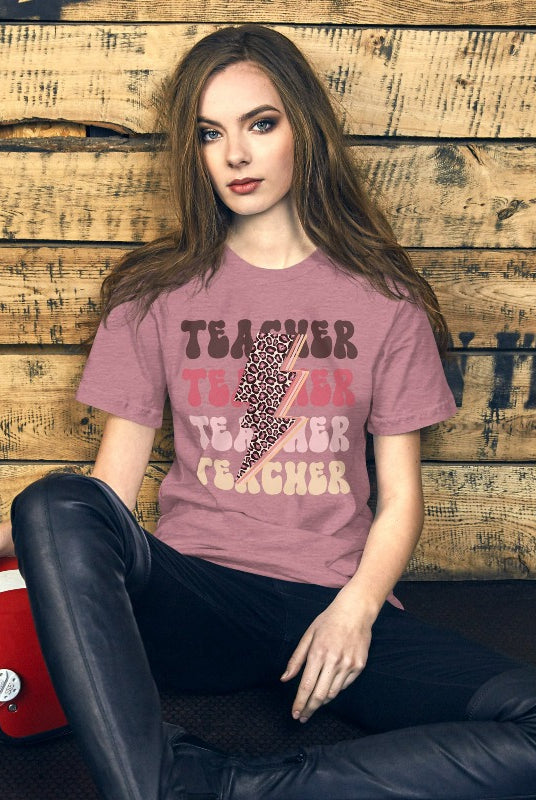 Mauve teacher graphic tee with pink cheetah lightning bolt and the word 'teacher' - perfect for teacher shirts and teacher gifts. Eye-catching graphic tee for educators.