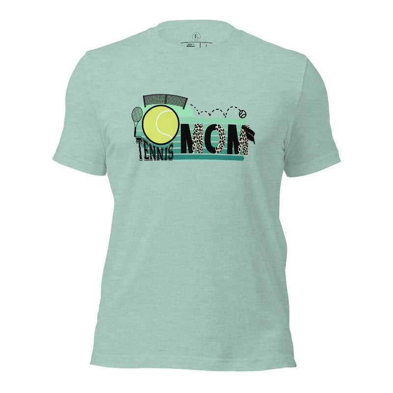 Serve up style and support with our chic tennis mom shirt. Designed for moms cheering on their tennis prodigies on a heather prism dusty blue shirt. 