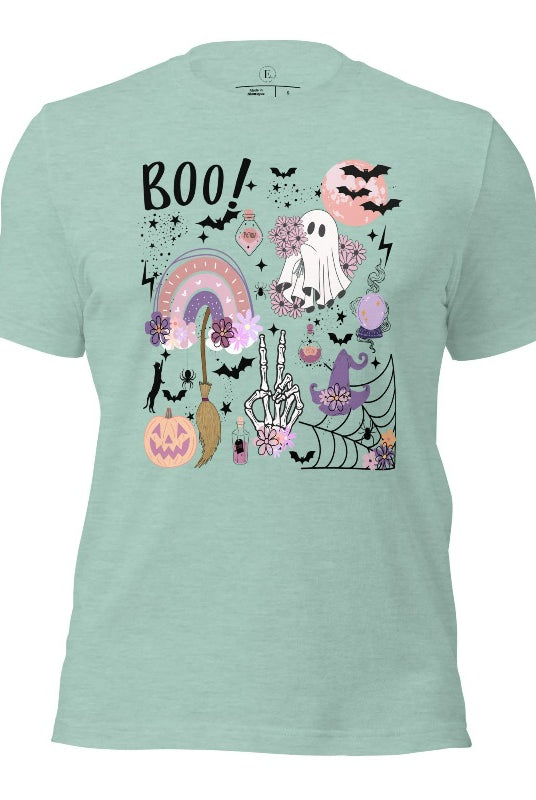 Experience the essence of Halloween with our bewitching shirt. Immerse yourself in a tapestry of Halloween symbols, from pumpkins to bats and witches, and all centered around the timeless exclamation, 'Boo!' This captivating design embodies the spirit of the season, on a heather prism dusty blue shirt. 