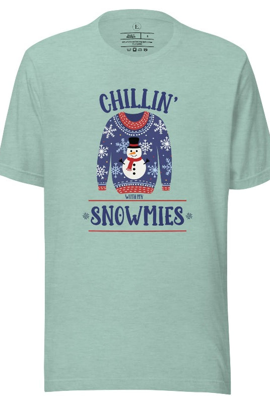 Get into the holiday spirit with our adorable Christmas sweater featuring a snowman and the playful phrase "Chillin' with my Snowmies" on heather prism dusty blue  colored shirt.