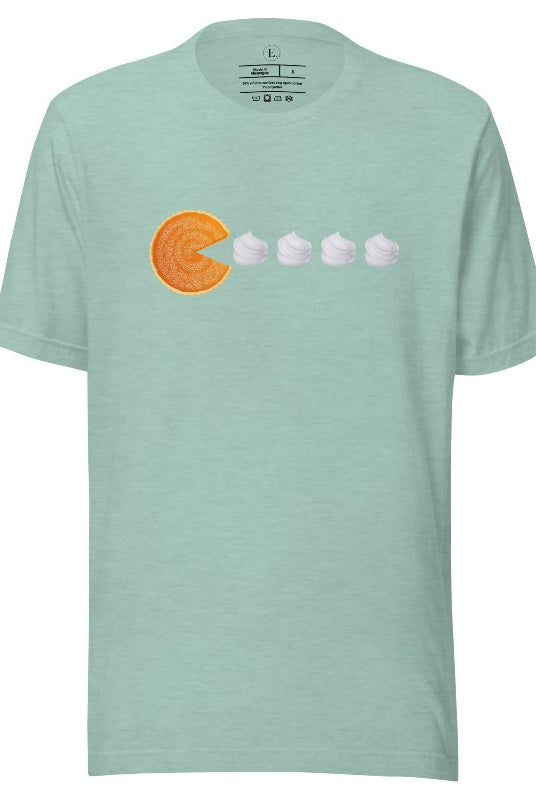 Level up your style with our playful t-shirt featuring a pumpkin pie shaped like Pac-Man devouring whipped cream swirls on a heather prism dusty blue shirt. 