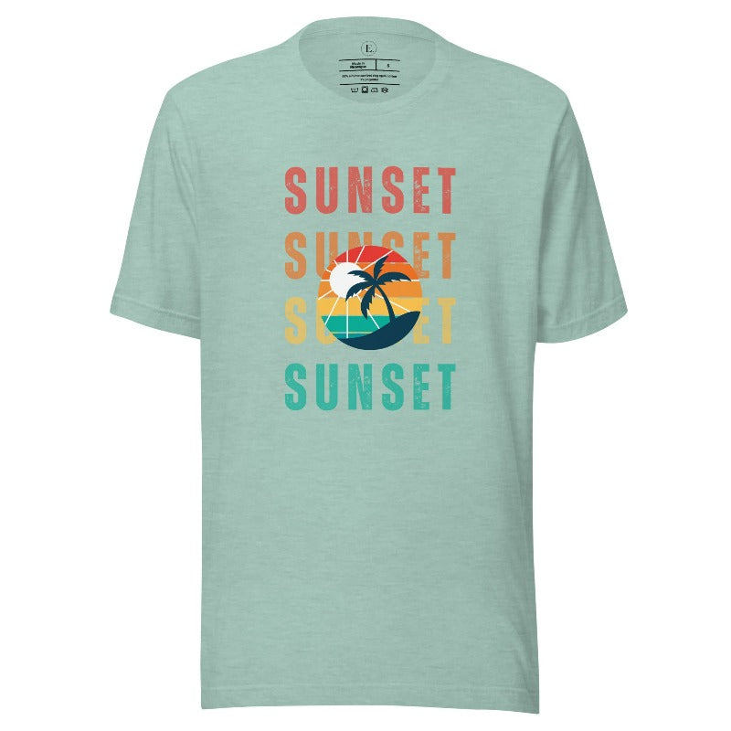 Capture the essence of tropical paradise with our Sunset t-shirt. Featuring four rows of the word 'sunset' surrounding a stunning palm tree on a heather prism dusty blue shirt. 
