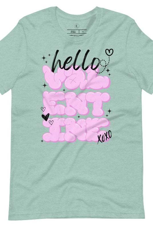 Make a bold statement this Valentine's Day with our street-style graffiti tee! Featuring "Hello Valentine" In eye-catching bubble lettering, on a heather prism dusty blue shirt. 