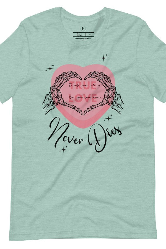 Embrace the unconventional with our Valentine's Day shirt featuring the bold statement "True Love, Never Dies" adorned with a heart and skeleton hands forming a heart shape on a heather prism dusty blue shirt. 