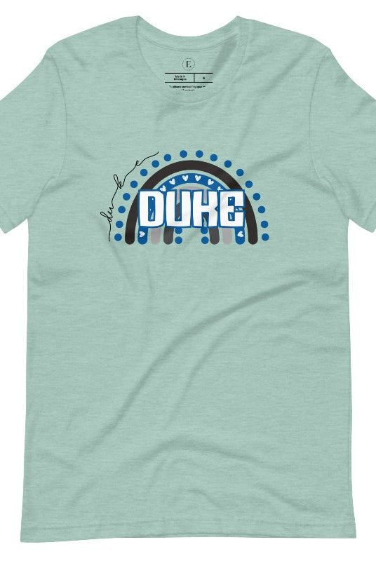 Celebrate diversity and show your support for Duke University with our eye-catching college t-shirt. Our shirt features the Duke colors on a captivating rainbow design, embodying the spirit of inclusion and unity with the iconic Duke wordmark atop the rainbow on a heather prism dusty blue shirt. 