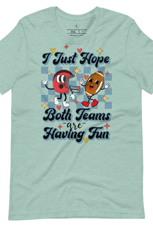 Dress in game day spirit with our Bella Canvas 3001 unisex tee! Featuring a retro design and the fun mantra, "I just hope both teams are having fun," on a heather prism dusty blue shirt. 