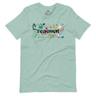 Teacher-themed graphic tee featuring the word 'Teacher' surrounded by all things related to teaching. Perfect for teacher shirts and teacher gifts. Mint blue graphic tees. 