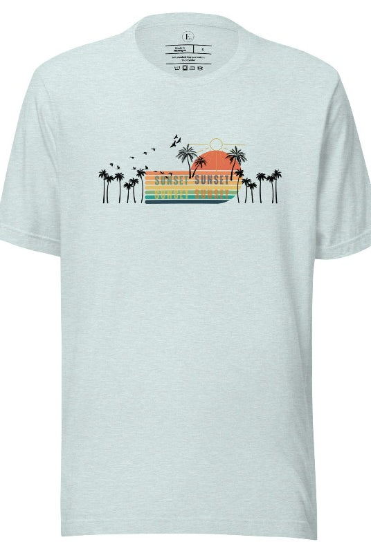 Transport yourself to a nostalgic beach getaway with our Retro Beach Shirt. Adorned with a captivating scene of a vintage sunset, palm trees, and seagulls soaring above on a heather prism ice blue shirt. 