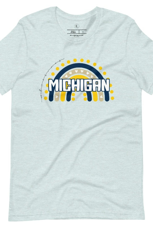Unleash your vibrant spirit with our Michigan graphic tee. Adorned with a rainbow in school colors and "Michigan" in playful block bubble lettering, this shirt exudes energy and Wolverine pride on a prism ice blue shirt. 