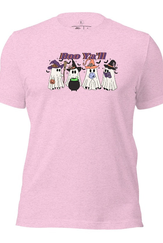 Embrace the spirit of Halloween with our spooktacular shirt. Join a mischievous gang of ghostly trick-or-treaters as they spread frightening fun. Featuring a playful 'Boo Ya'll' message, on a heather prism lilac colored shirt. 