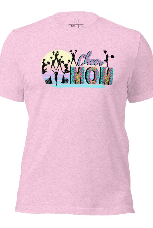 Get your cheer on with our stylish cheer mom shirt. Perfect for proud moms supporting their cheering stars. Made with love, this shirt combines comfort and fashion, letting you show off your team spirit. Join the cheer squad and cheer your heart out in style on a heather prism lilac shirt. 