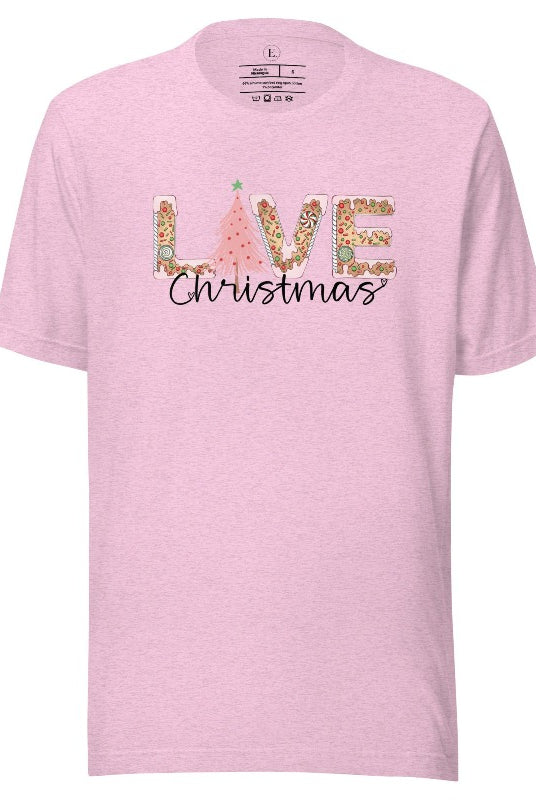Get ready to celebrate the holiday season in style with our Christmas shirt featuring cute gingerbread cookies arranged to spell out the word "Love" on a heather prism lilac colored shirt.