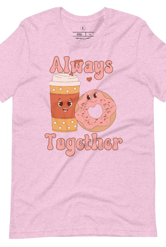 Celebrate love with our adorable Valentine's Day graphic tee! Featuring a smiling coffee cup and a cheerful donut holding hands, on a heather prism lilac shirt. 
