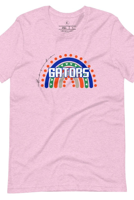 Show off your UF spirit in style with this boho-inspired t-shirt from the University of Florida. The UF colors stands out on this vibrant rainbow background, displaying the school's mascot name in a trendy and unique way on a pink shirt. 