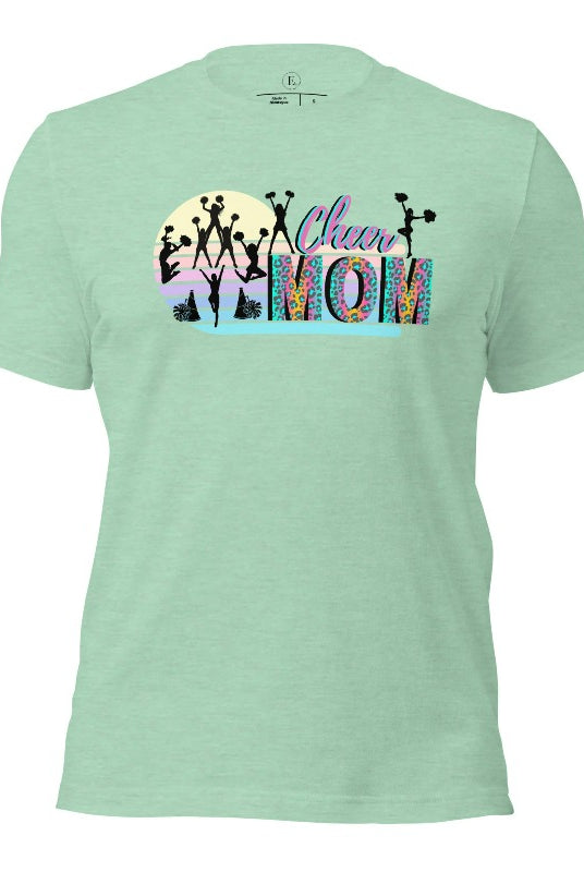 Get your cheer on with our stylish cheer mom shirt. Perfect for proud moms supporting their cheering stars. Made with love, this shirt combines comfort and fashion, letting you show off your team spirit. Join the cheer squad and cheer your heart out in style on a heather prism mint shirt. 
