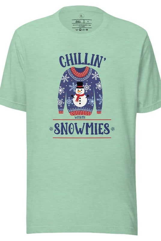 Get into the holiday spirit with our adorable Christmas sweater featuring a snowman and the playful phrase "Chillin' with my Snowmies" on heather prism mint colored shirt.