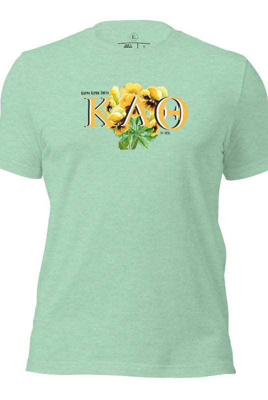 Show your Kappa Alpha Theta pride with our sorority t-shirt! Our design features the sorority letters and a striking black and gold pansy, symbolizing sisterhood and strength on a heather prism mint shirt. 