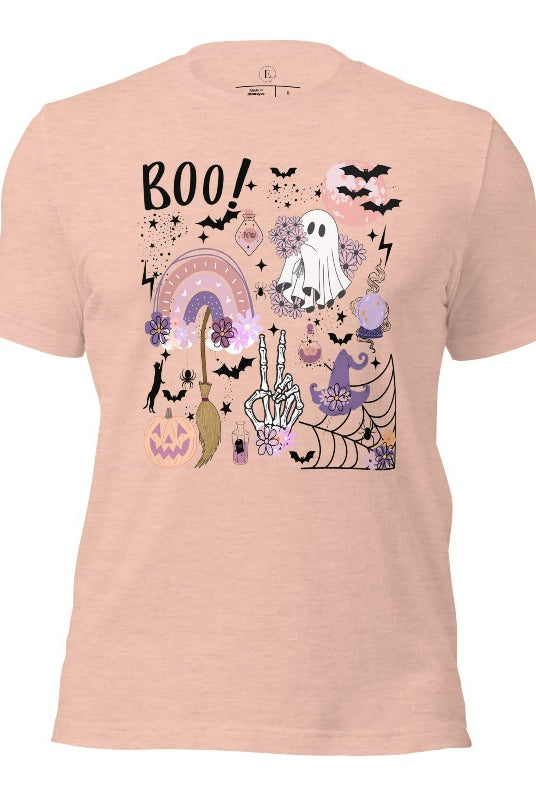 Experience the essence of Halloween with our bewitching shirt. Immerse yourself in a tapestry of Halloween symbols, from pumpkins to bats and witches, and all centered around the timeless exclamation, 'Boo!' This captivating design embodies the spirit of the season, on a heather prism peach shirt. 