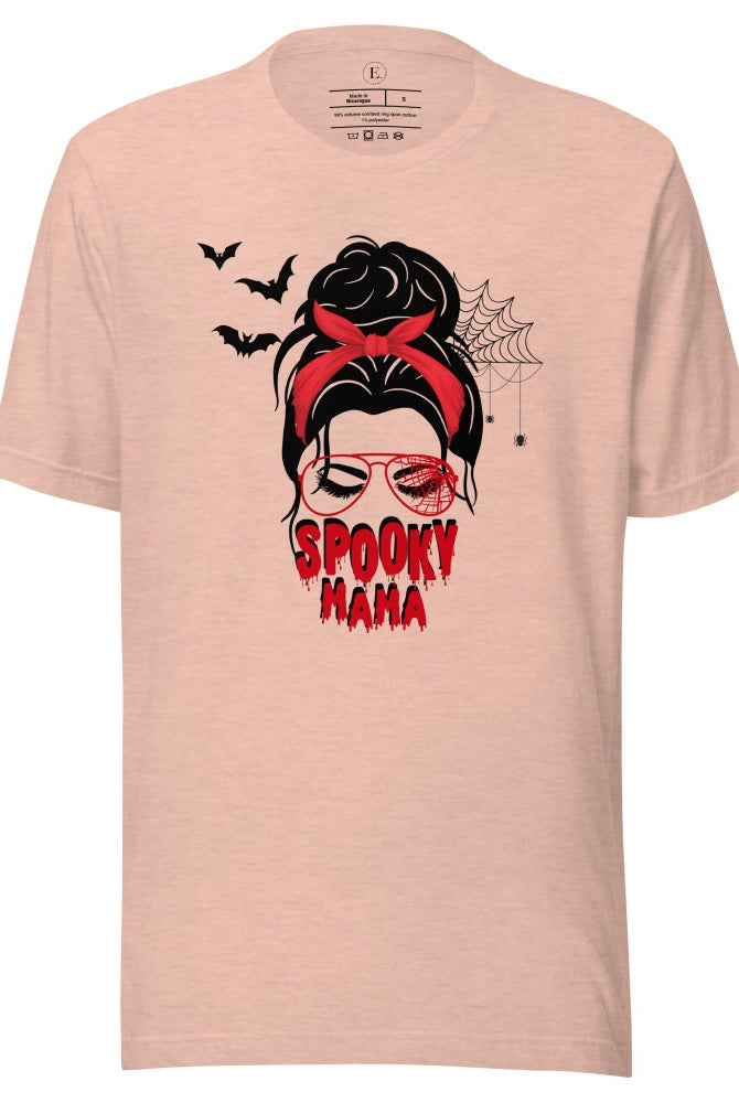 "Spooky Mama" messy bun Halloween T-shirt on heather prism peach colored t-shirt.