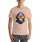 A gorilla wearing sunglasses Infront of a retro sunset on a heather prism peach colored shirt.