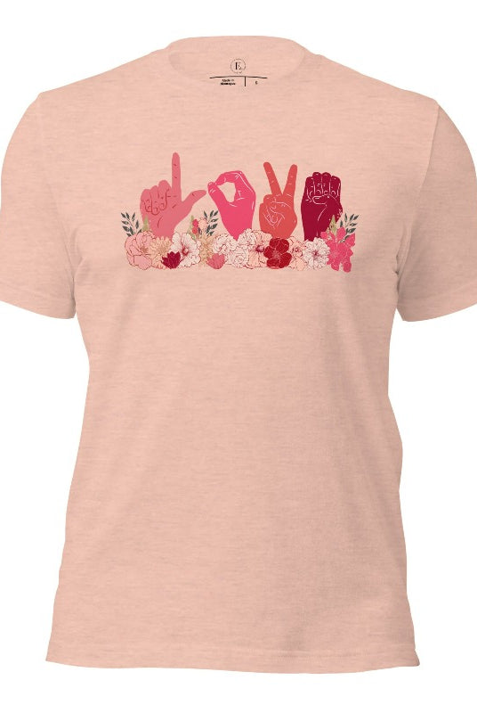 ASL hands signing love in floral flowers on a heather prism peach colored shirt.