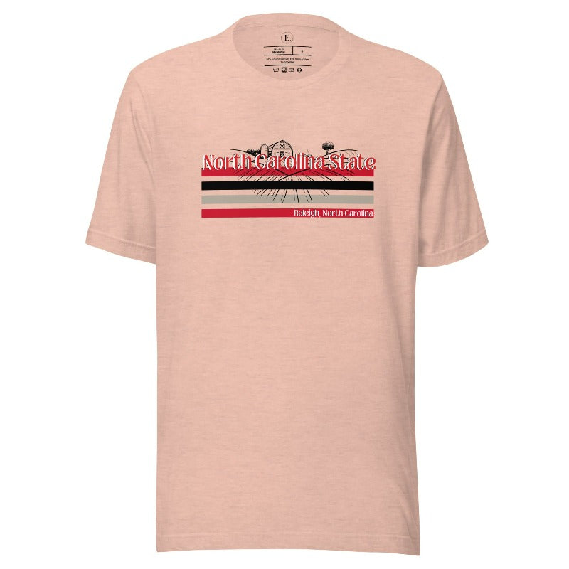 NC State retro-inspired shirt paying homeage to the schools rich history and renowned agricultural programs. Design on a heather prism peach colored shirt.