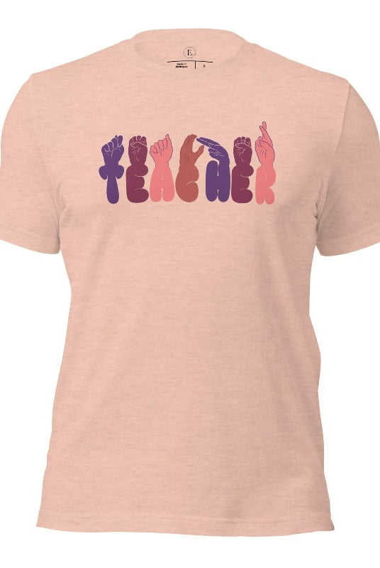 Let's celebrate our educators with this unique ASL teacher t-shirt. The word "teacher" is spelled out in American Sign Language using expertly crafted hands, highlighting their vital role in shaping our society. ASL teacher on a heather prism peach colored shirt.