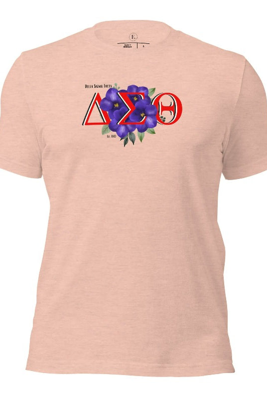 Show off your Delta Sigma Theta sisterhood with our exclusive sorority t-shirt design! The t-shirt features the sorority's letters along with the vibrant African violet, symbolizing empowerment, strength, and courage on a heather prism peach shirt. 