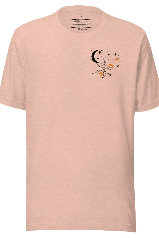 Embrace the enchanting night sky with our captivating t-shirt. Featuring a crescent moon, stars, and a spiderweb with three adorable spiders hanging down on the front pocket on a heather prism peach shirt. 
